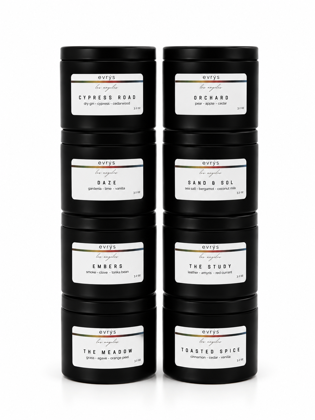 Set of black candles with labels in two stacks of four on a white background 