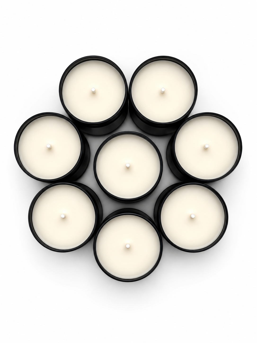 Eight white candles in black holders arranged in a circle on a white background