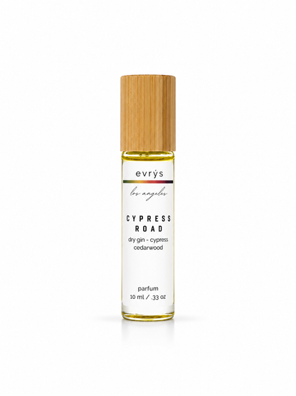 evrys Cypress Road oil roller perfume bottle on a white background