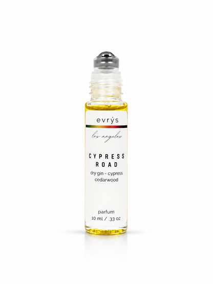 evrys Cypress Road oil roller perfume bottle on a white background