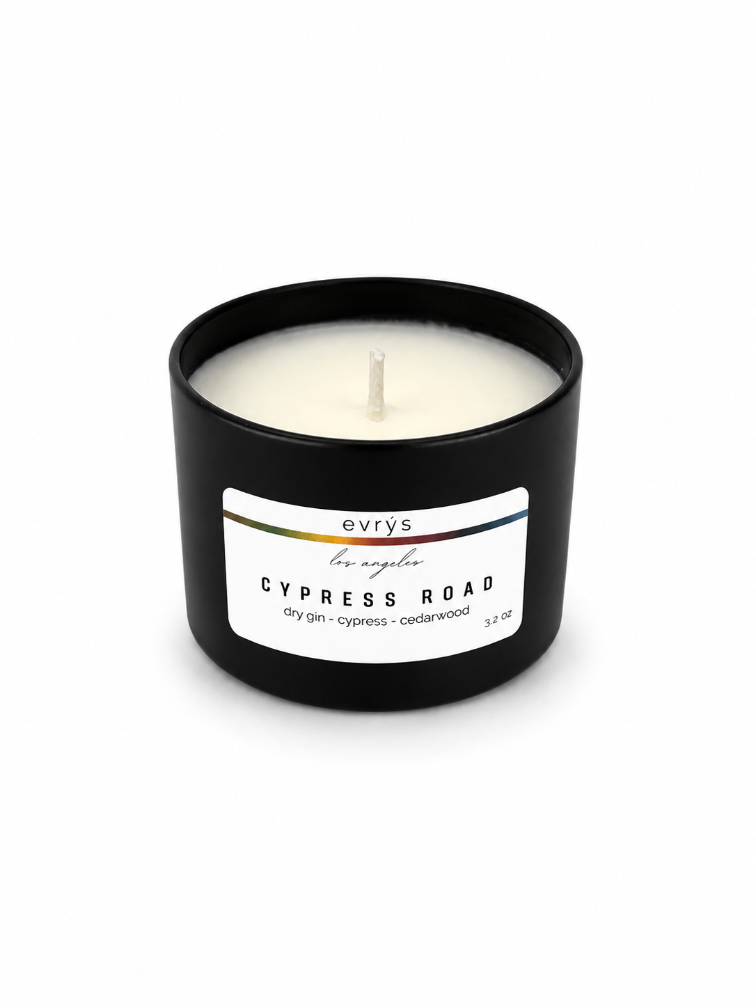 Candle in a black container with an evrys Cypress Road  label on a white background