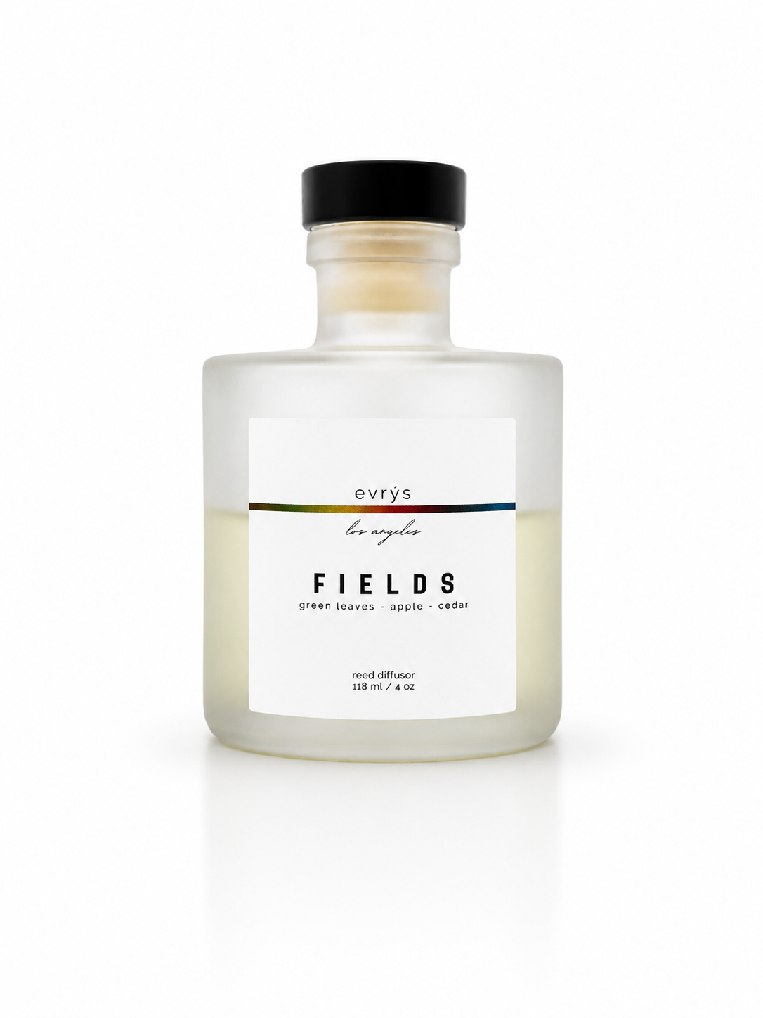 Glass reed diffuser bottle labeled 'Fields' by evrys on a white background