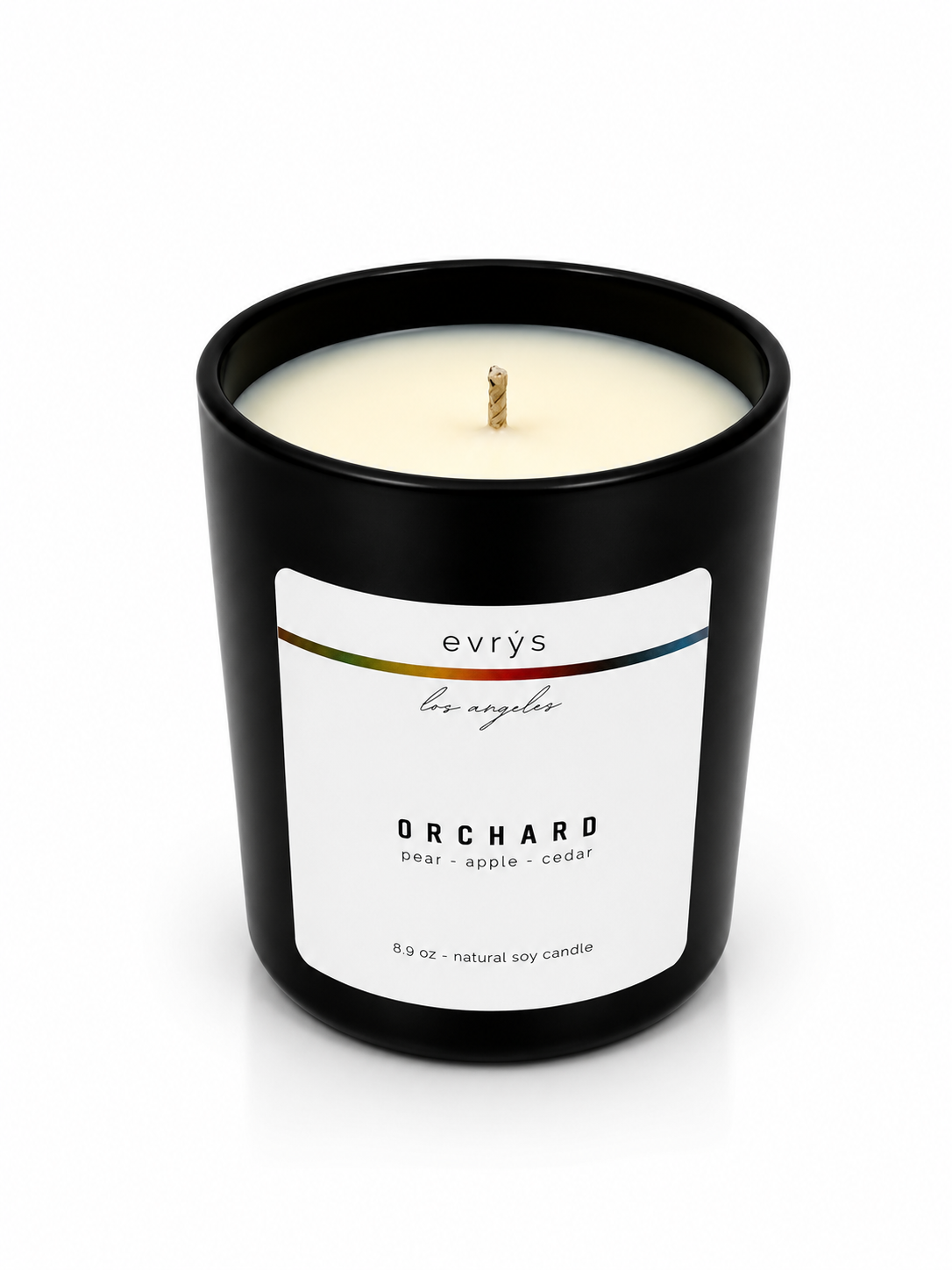 evrys candle labeled 'Orchard' on a white background