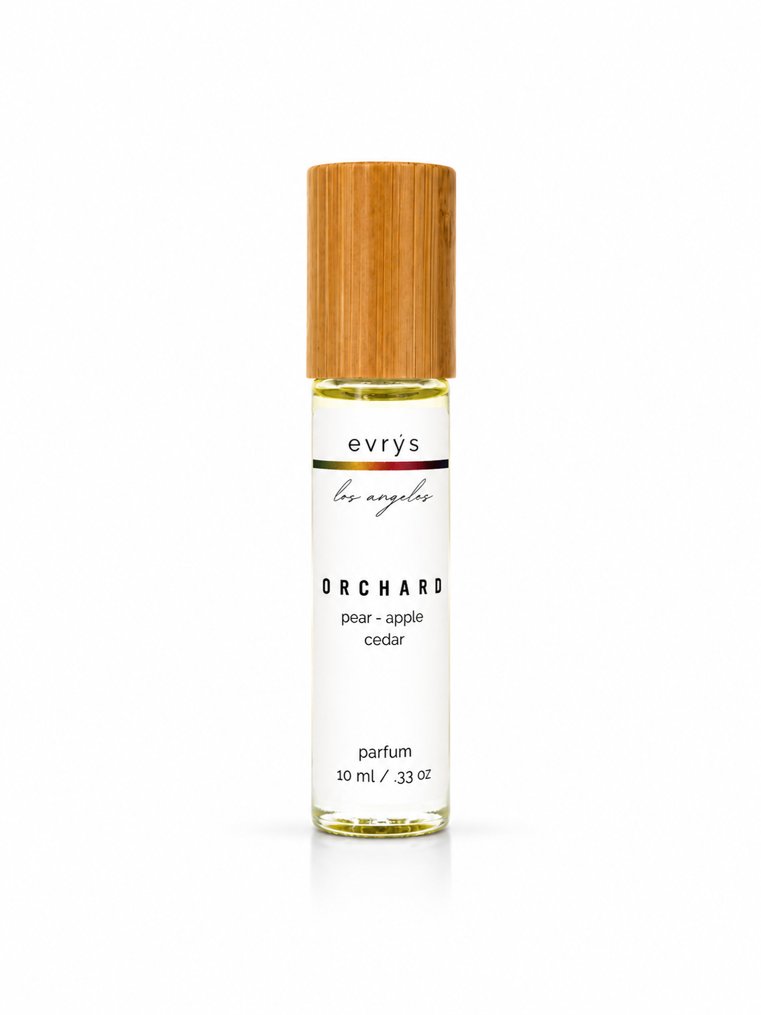 evrys Orchard oil roller perfume bottle on a white background