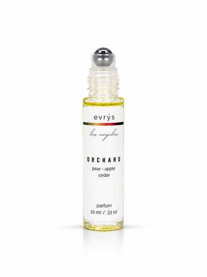 evrys Orchard oil perfume roller bottle on a white background