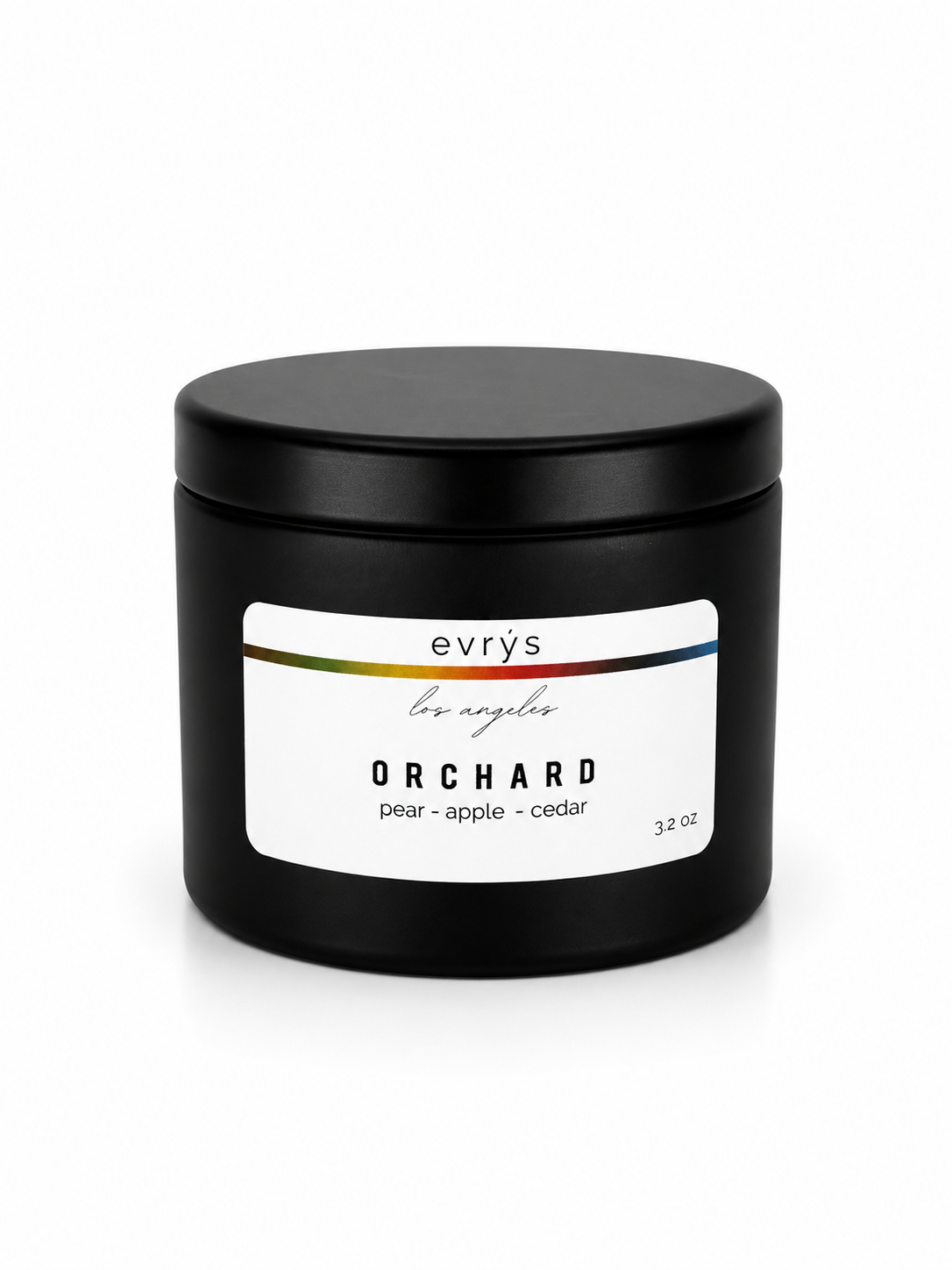 Black candle jar with 'evrys' Orchard label on a white background