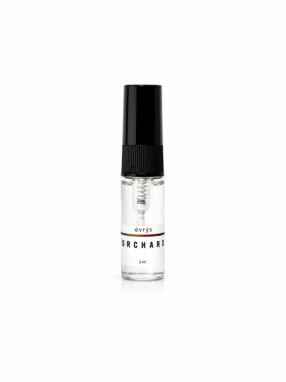 Small fragrance bottle with an evrys Orchard label and a black cap on a white background