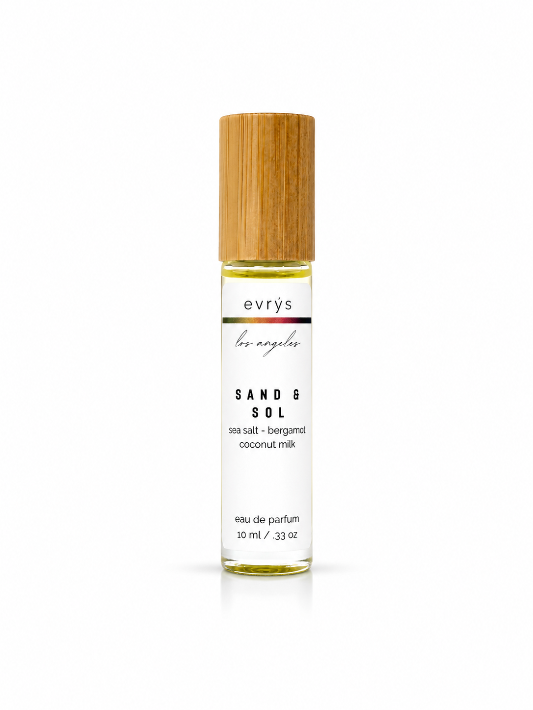 evrys Sand & Sol oil roller perfume bottle on a white background