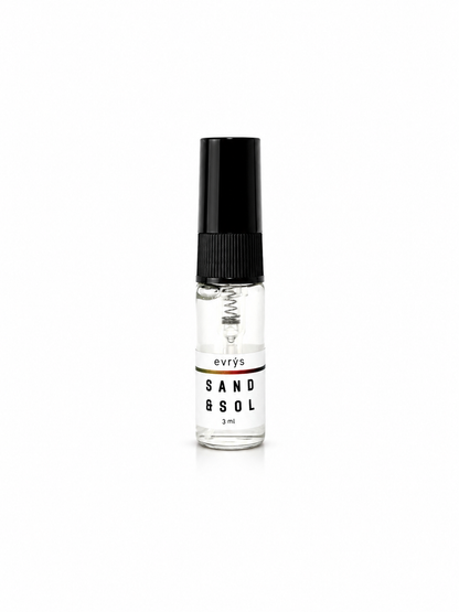 Small fragrance spray bottle labeled 'Sand & Sol' by evrys on a white background