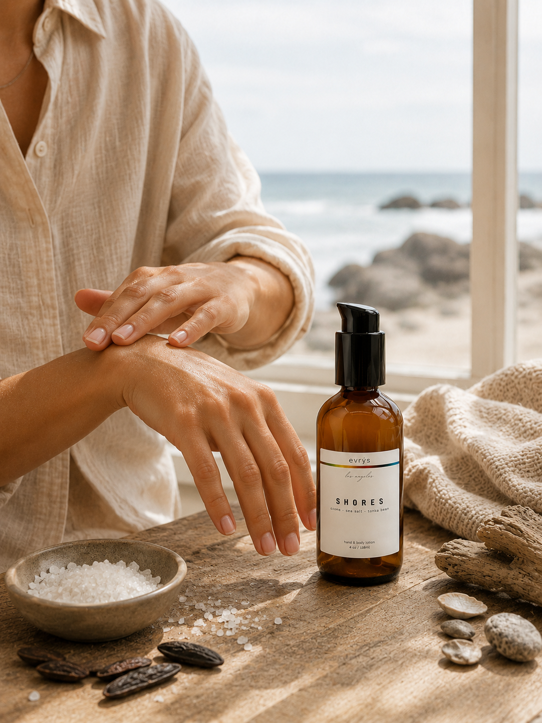 Person applying SHORES lotion with a scenic background