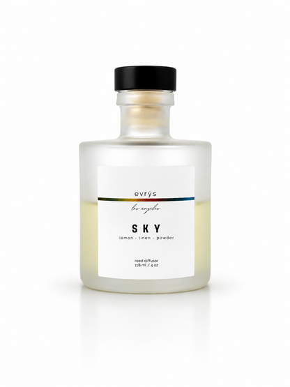 Glass reed diffuser bottle labeled 'Sky' by evrys on a white background