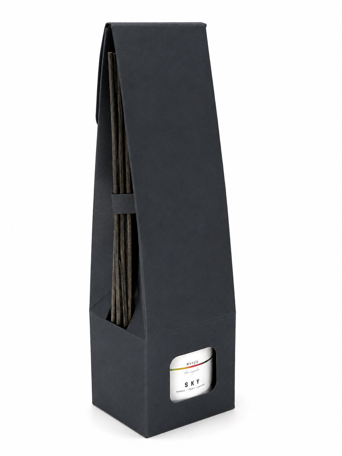 Black reed diffuser box with a label on a white background
