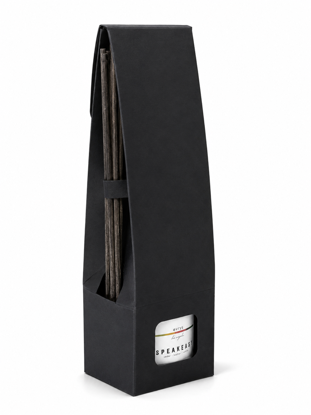 Black rectangular packaging with a cylindrical product inside on a white background
