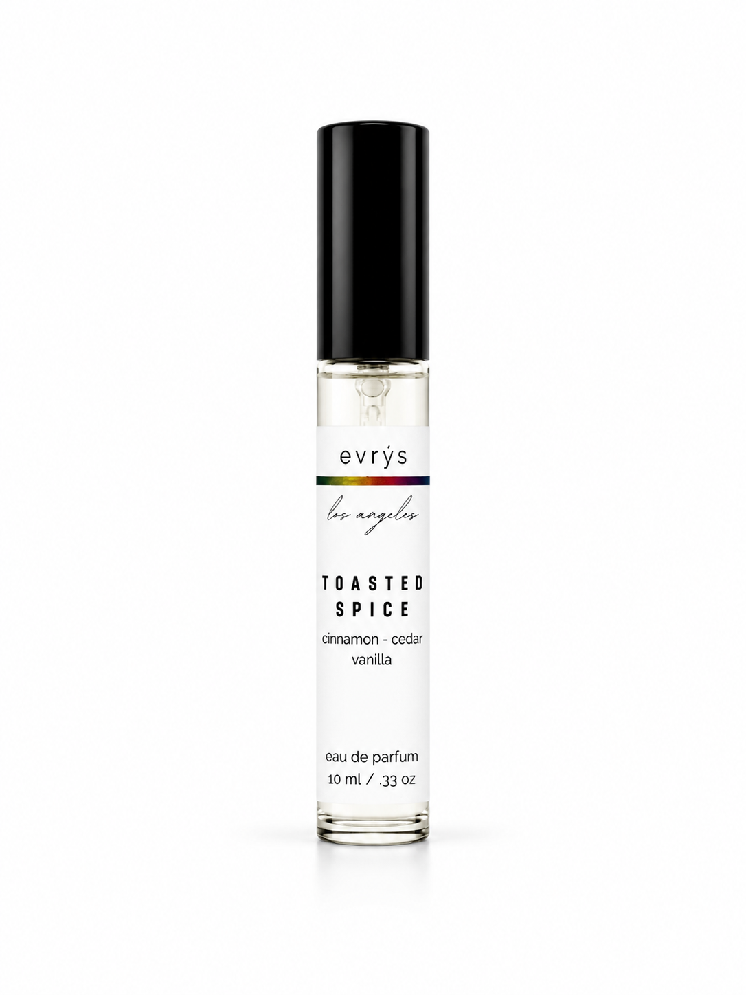 Perfume bottle with Toasted Spice label on a white background