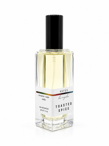 Perfume bottle labeled 'Toasted Spice' by evrys on a white background