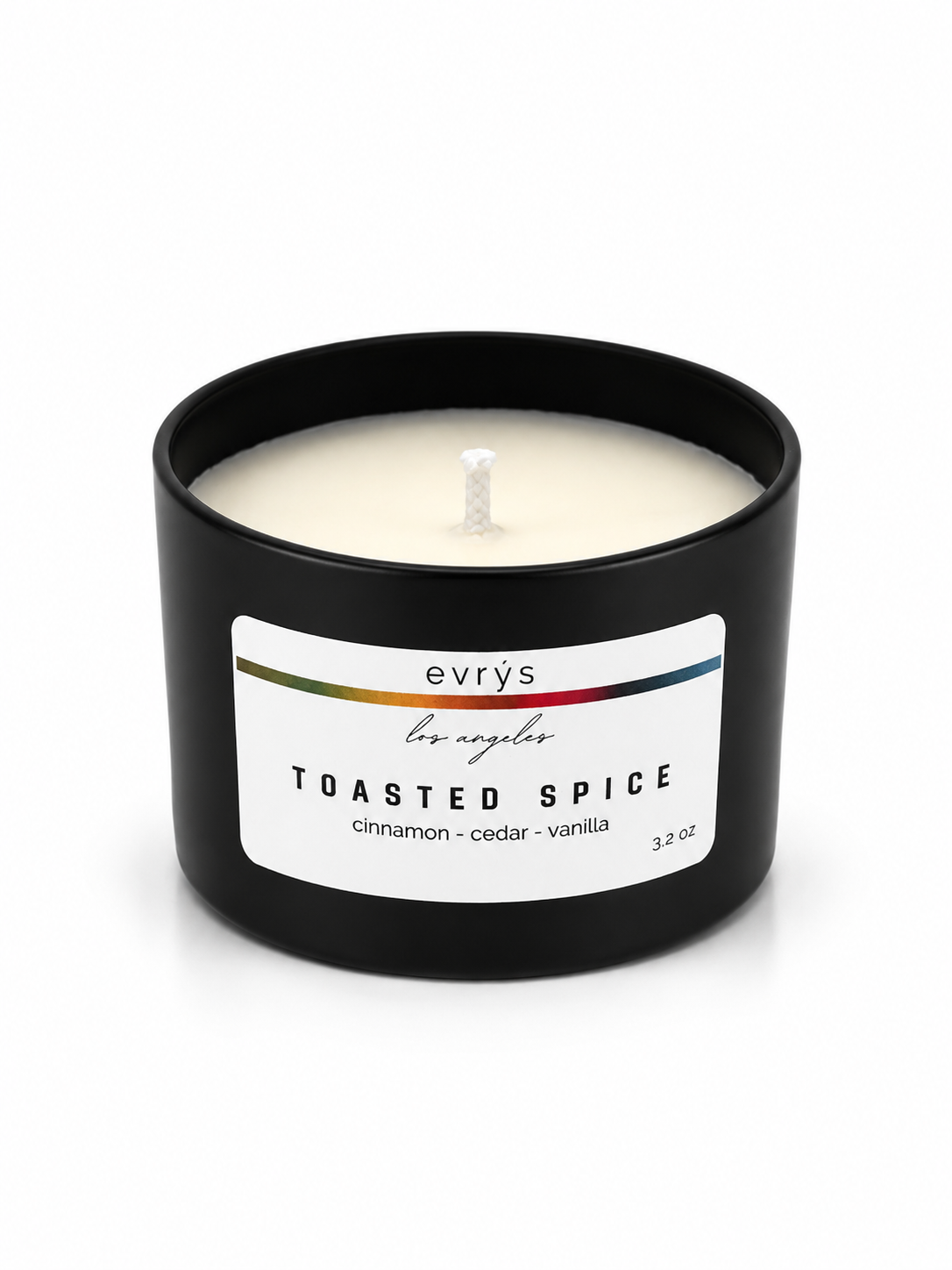 Evrys toasted spice candle in a black container on a white background